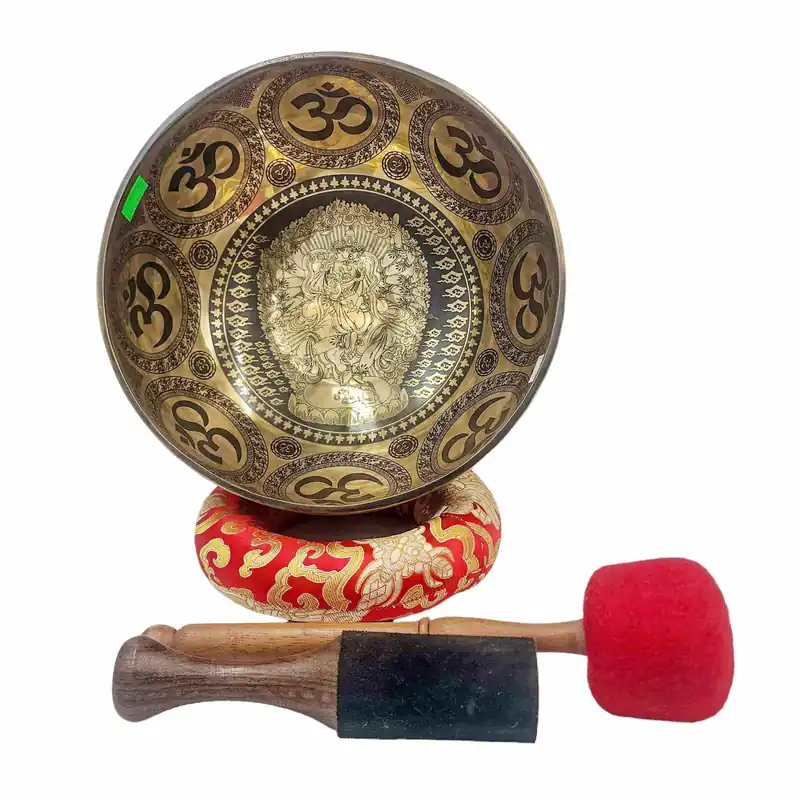 Bol chantant battu à la main avec OM et Ganesh