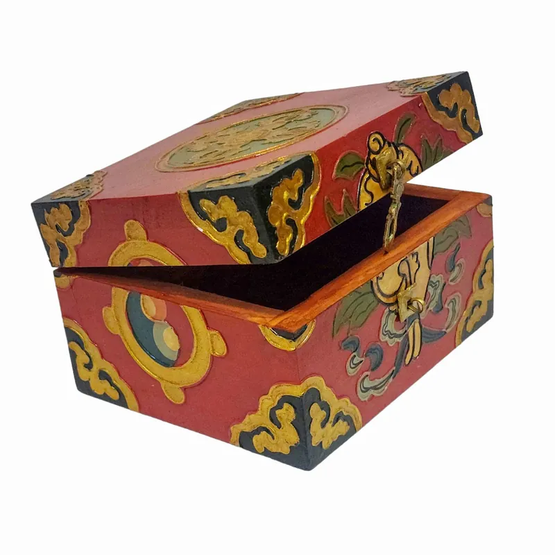 Boîte rituelle tibétaine en bois dans des couleurs traditionnelles