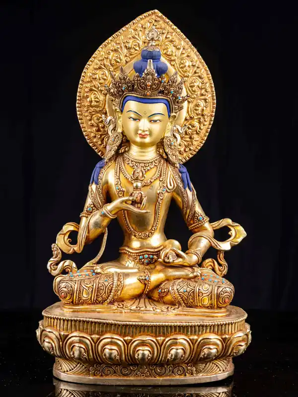 Statue de Vajrasattva en cuivre avec un visage doré