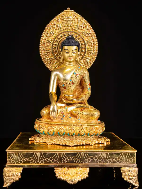 Statue en cuivre de Shakyamuni Bouddha avec un visage en or