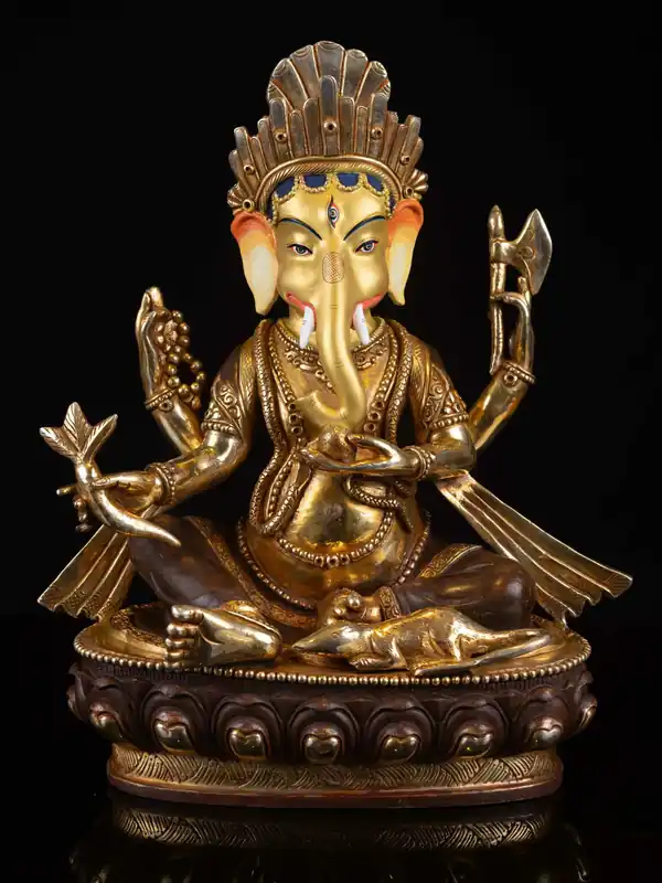 Statue de Ganesh en cuivre avec visage doré
