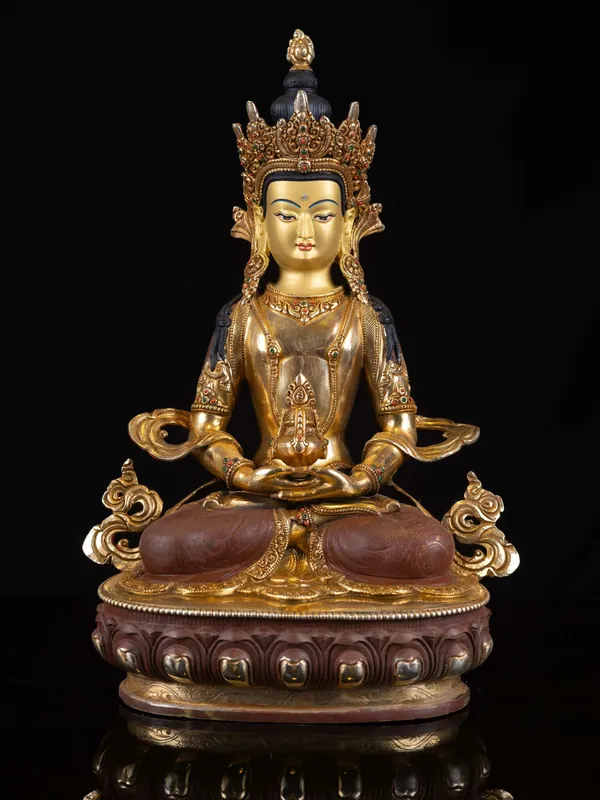 Statue du Bouddha Aparimita – Cuivre, visage plaqué or