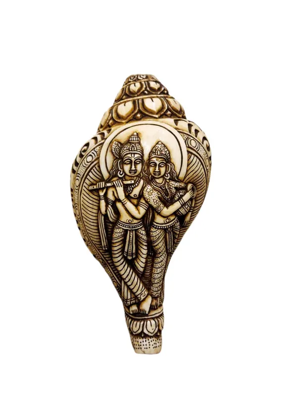 Sculpture en coquillage de conque représentant Radha et Krishna