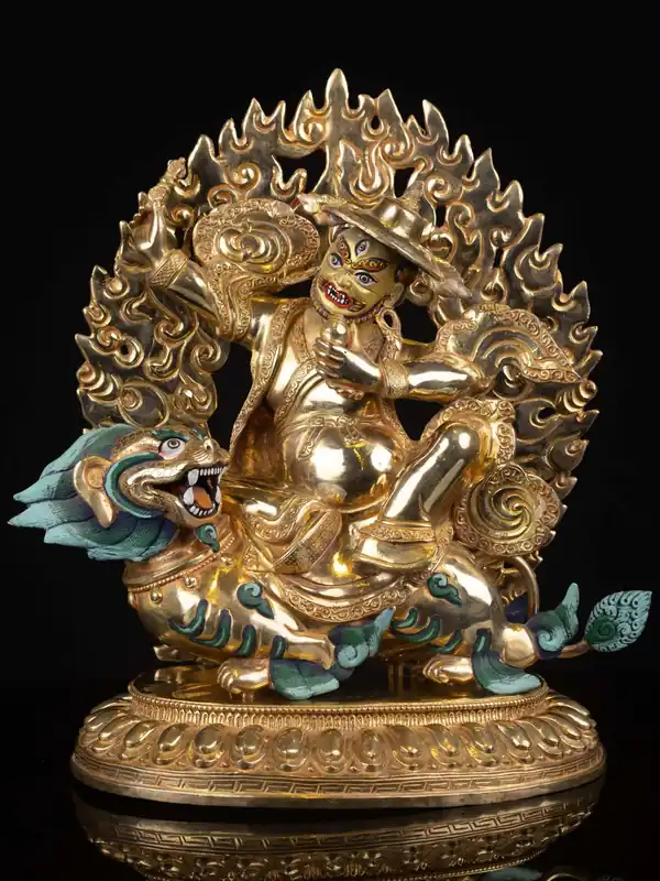 Statue de Shugden en cuivre avec un visage plaqué or