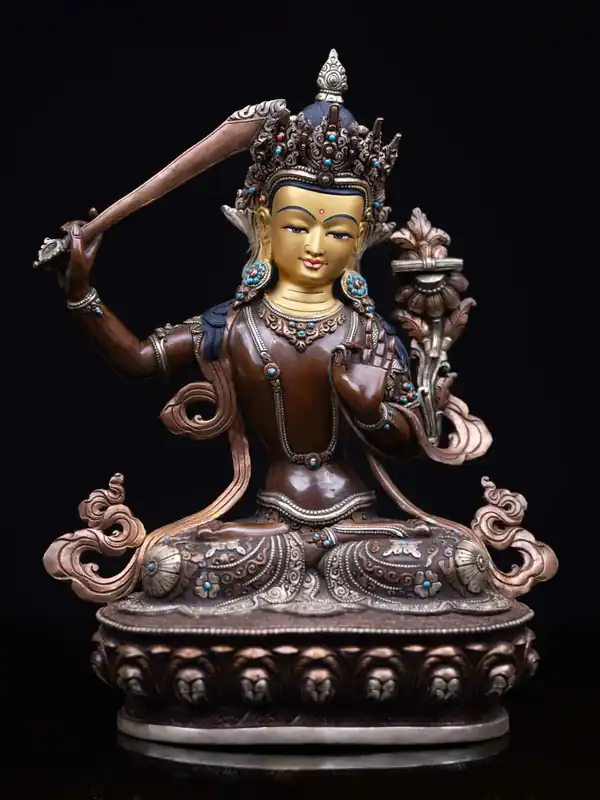 Statue en cuivre de Manjushri avec finition argentée