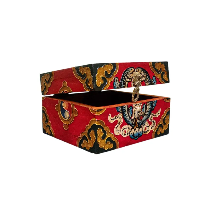Boîte tibétaine présentant un design de poissons doubles dans des couleurs traditionnelles