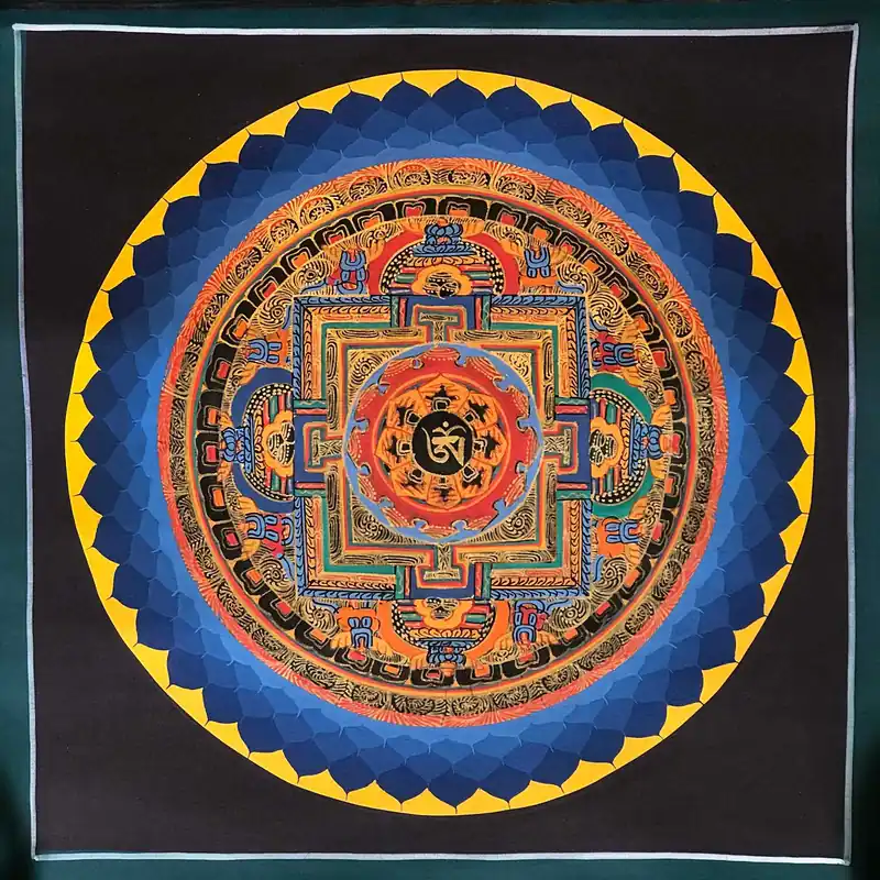 Le Mandala Om tibétain avec un fond sombre