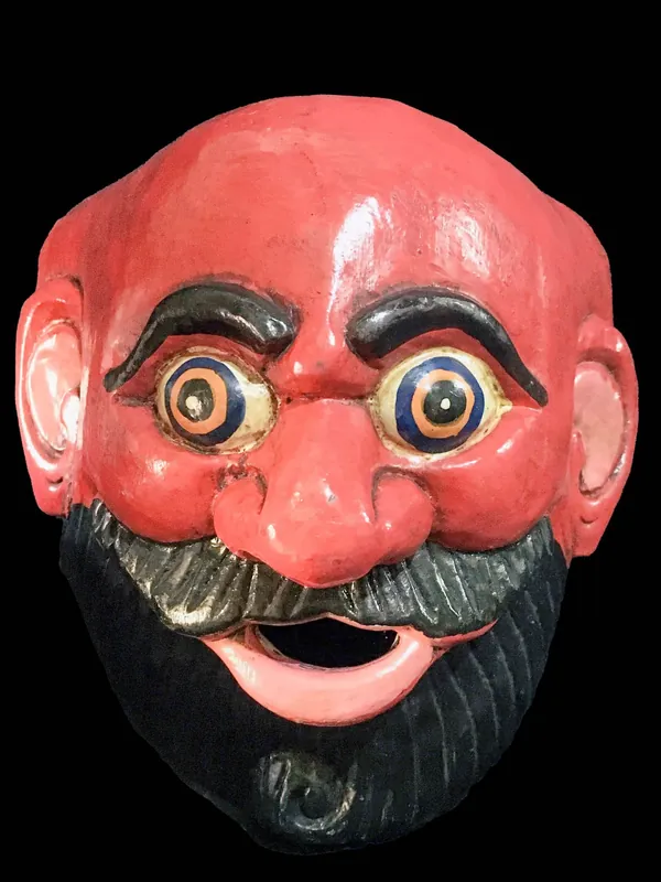 Masque en bois du Joker rouge