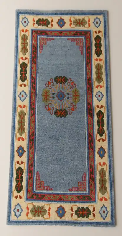 Tapis tibétain avec motif de pièces