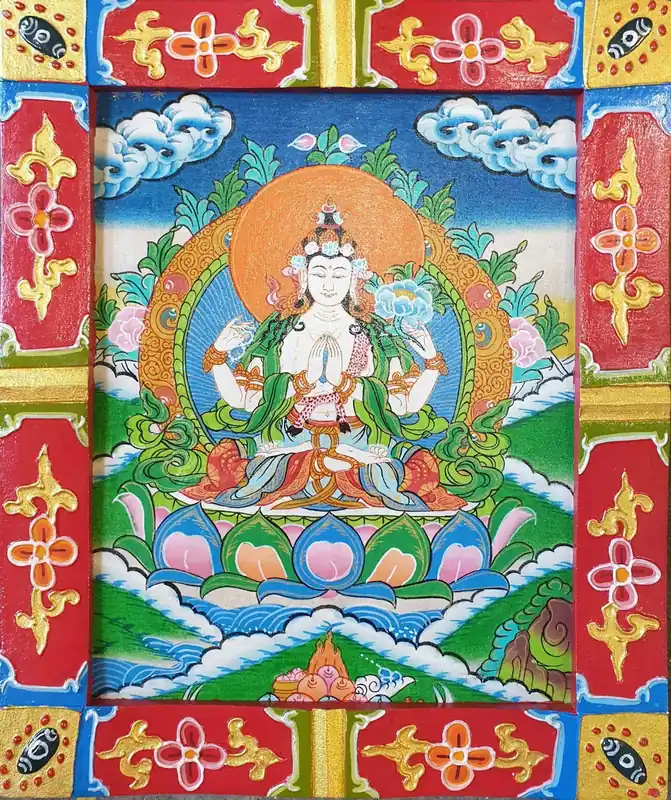 Art traditionnel de peinture de Chenrezig dans un cadre en bois