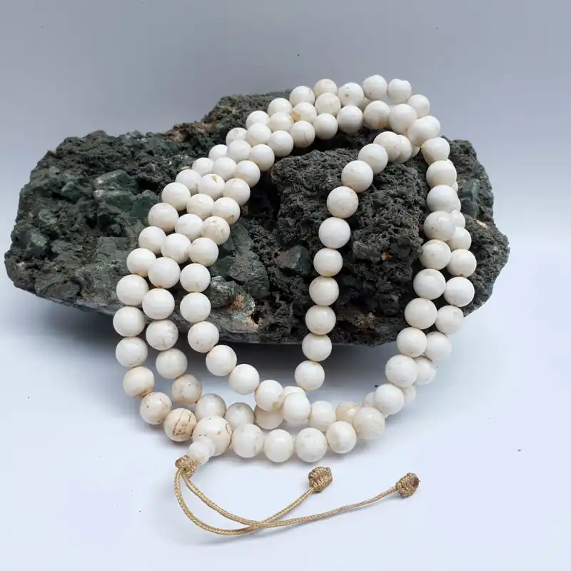 Le Mala de prière en 108 perles de coquillage
