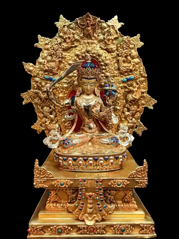 Statue sculptée à la main de Manjushri, le Bouddha de la sagesse.