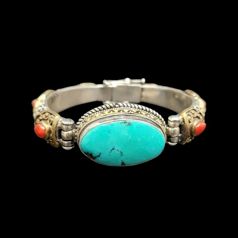 Bracelet en métal argenté avec incrustation de pierres précieuses