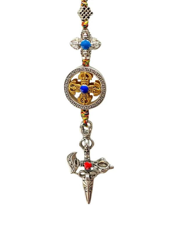 Amulette en métal bouddhiste avec dorje double et phurba