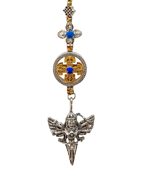 Amulette bouddhiste avec double dorje et phurba