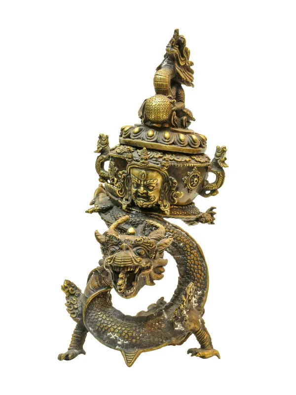Brûleur d’encens en laiton représentant le visage de Mahakala avec un design de dragon