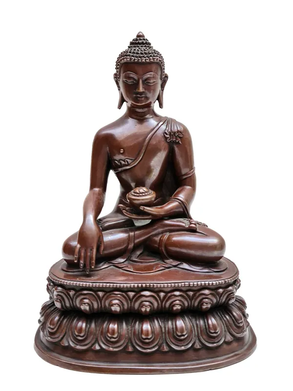 Statue en cuivre du Bouddha Siddhartha Gautama, utilisée dans les rituels.