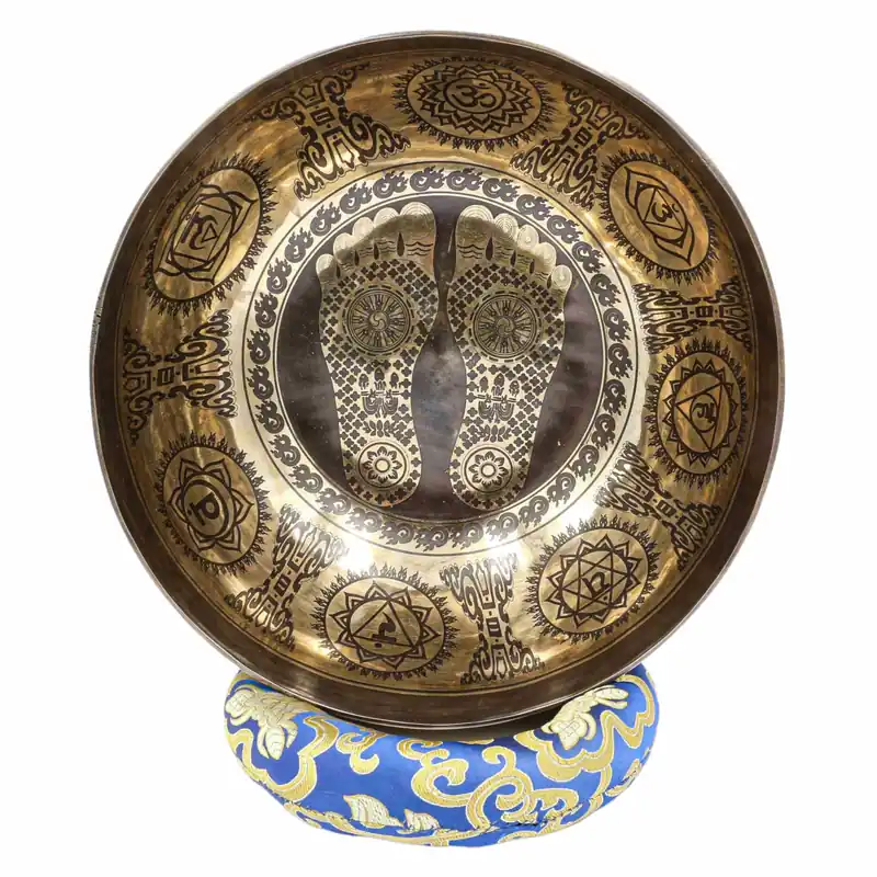 Bol chantant Jambati sculpté avec des pieds de Bouddha