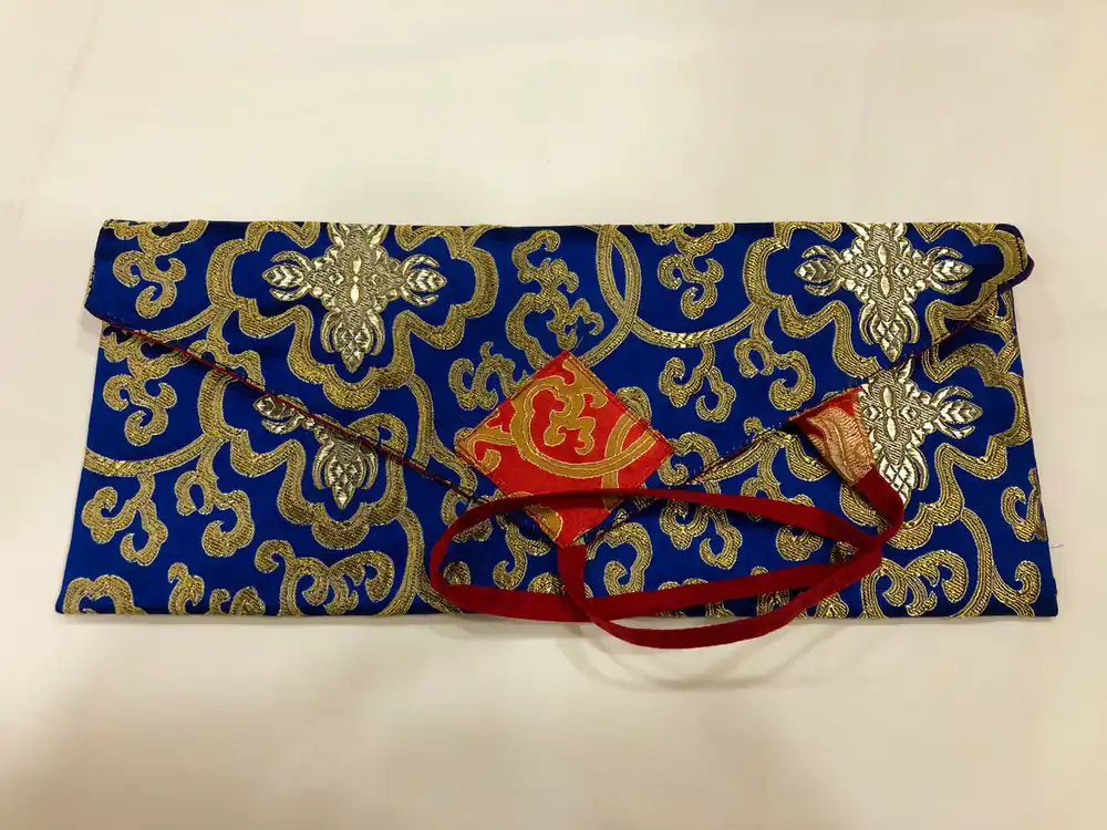 Couverture de pecha en brocart de soie bleue